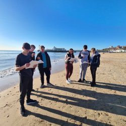 Image of students on Bournemouth Beach